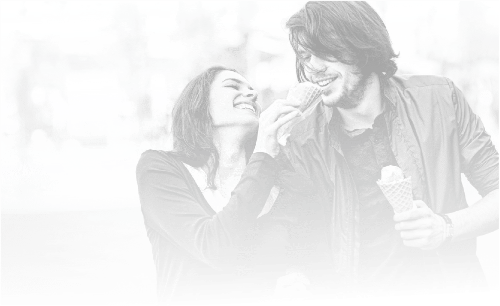 Happy couple smiling, advertising Mates Condoms